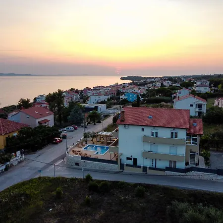 M Kožino